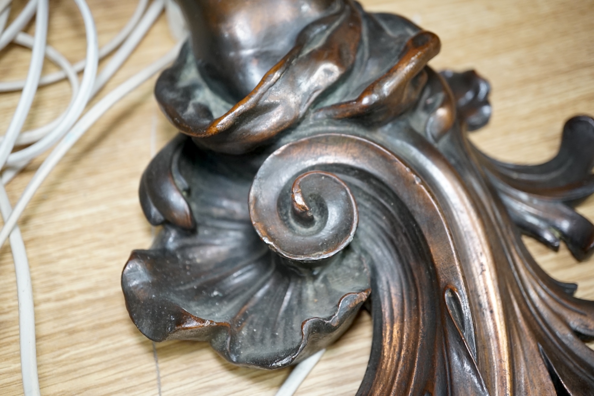 A pair of cast metal caryatid putti two light wall sconces, 45cm high. Condition - poor